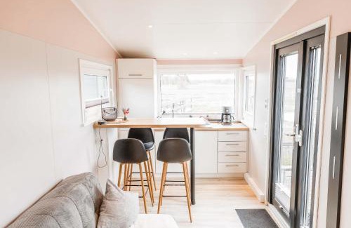 Grasberg House | Discover Huxfeld-Hof: Family-Friendly Tiny House Getaway
