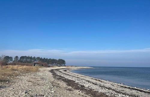 Nykobing Sjaelland House | Bright Beach House Retreat Steps from Klint's Pristine Sand