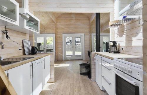 Nykobing Sjaelland House | Bright Beach House Retreat Steps from Klint's Pristine Sand