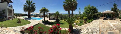 Koropi Hotel | Relax at Iakovakis Suites & Spa: 4-Star Comfort Awaits