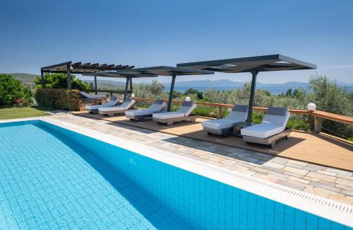 Koropi Hotel | Relax at Iakovakis Suites & Spa: 4-Star Comfort Awaits