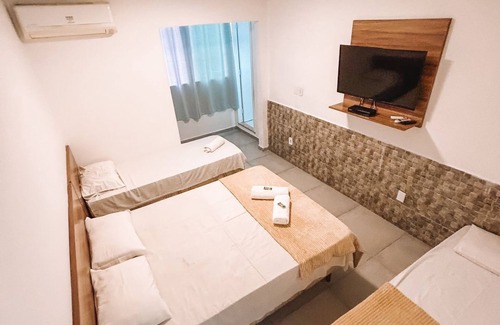 Foguete Hotel | Relaxing IBELLO BEACH Pousada: Family-Friendly with Pool