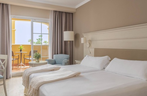 Torrox Costa Hotel | Discover Iberostar Málaga Playa: 4-Star Family Retreat