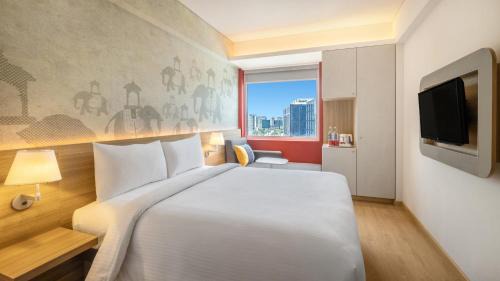 Vyalikaval HBCS Layout Hotel | Discover ibis Bengaluru Hebbal: Family-Friendly & Pet Welcoming