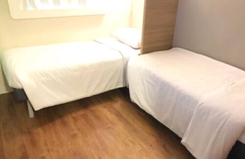 Manhuacu Hotel | Budget-Friendly Ibis Budget Manhuacu with Pool & Dining