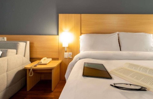 Santa Cecilia Hotel | Discover Comfort at ibis Paulinia with Pool & Dining Options