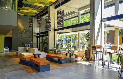 Auxiliadora Hotel | Stylish Ibis Styles Porto Alegre with Spa & Family Comfort