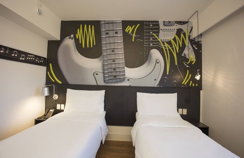 Piracangagua Hotel | Discover Ibis Styles Taubate: Guest Rated 9.2 with Pool