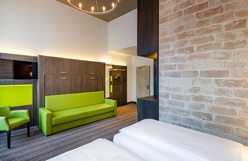 Mitte Hotel | Discover ibis Styles Trier: Family-Friendly with Pool Access