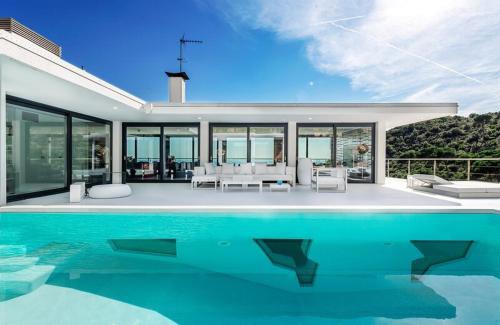 Mas Ram Villa | Experience Ibiza Style Barcelona with Pool and Family Amenities