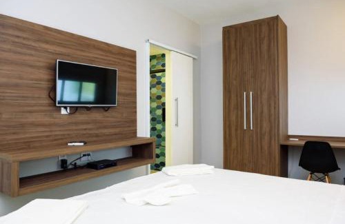 Icarai House | Inviting Icaraí Suítes: Family-Friendly with Kitchen Access