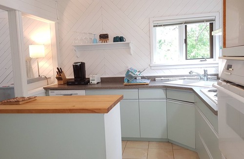 Sandy Hook House | Explore Year-Round Ice Fishing at Gimli with Ocean Views
