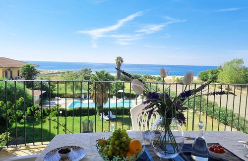 Capo Rizzuto Apartment | Perfect City Retreat with Oceanfront Views and Pool Access