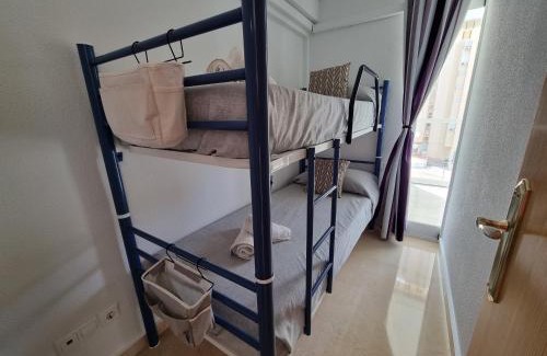 Rincon de Loix Apartment | Perfect Family Getaway Near Levante Beach with Pool & Wifi