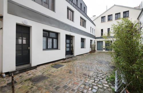 Quartier du Faubourg-Montmartre Apartment | Explore Paris on Foot from Our 4-Star Family-Friendly Hotel