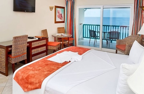 St. Lawrence Gap Hotel | Convenient Oceanfront Retreat with Pool & Kitchenette