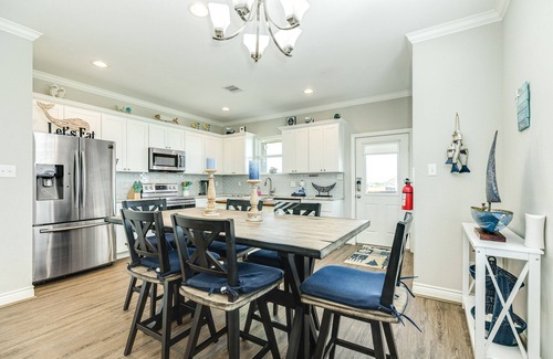 Galveston House | Beachfront Retreat with Balconies & Outdoor Shower Access