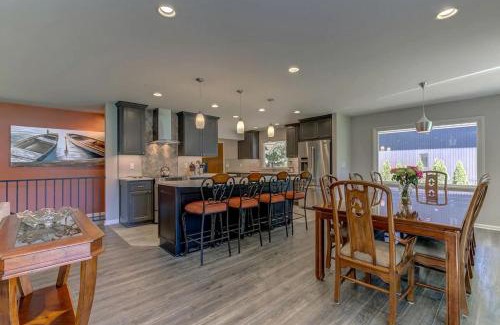 Post Falls House | Idyllic Riverside Vacation Retreat with Sandy Beach near Coeur d'Alene Idaho