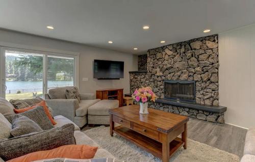 Post Falls House | Idyllic Riverside Vacation Retreat with Sandy Beach near Coeur d'Alene Idaho