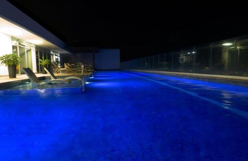 Curridabat Apartment | iFreses Lofts: Eco-Friendly with Pool & City Views