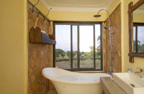 Kasese Cabin | Discover Ihamba Lakeside Safari Lodge: Rated 9.6/10 Stay