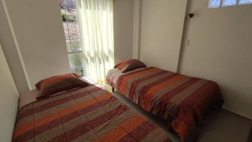 Cusco Historic Center Apartment | Inviting III Zaguan Aparta Hotel in Cusco - Family Friendly