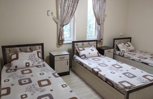 Bukhara House | IKAT with Terrace: Perfect for Families and Pet Lovers