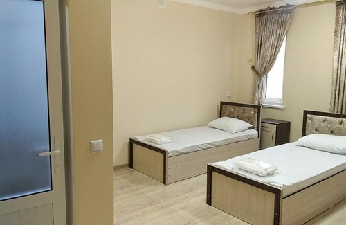 Bukhara House | IKAT with Terrace: Perfect for Families and Pet Lovers