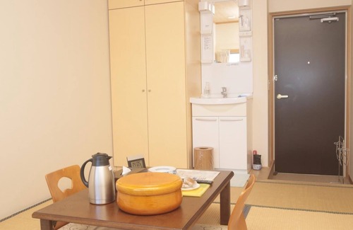 Katsumoto Hotel | Discover Ikijimaso: Eco-Friendly Retreat with Breakfast