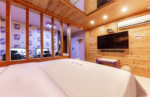 Songman Hotel | Eco-Friendly Iksan Soo: Family-Friendly with Hot Tub