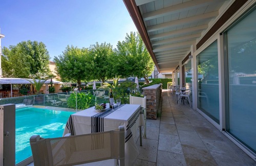 Lido di Camaiore Apartment | Beachside Retreat: Il Bacco with Ocean Views & Pool