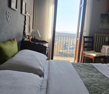 Castellinaldo Bed & Breakfast | Discover Il Borgo B&B: Rated 9/10 with Cozy Amenities