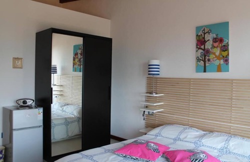 Vulcano Porto Bed & Breakfast | Inviting Il Caimano B&B with Oceanfront Pool & Spa