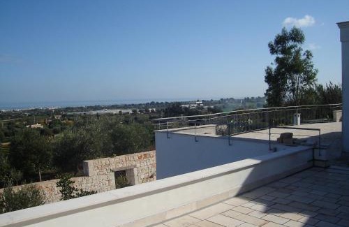 Polignano a Mare House | Discover Il Carrubo: Oceanfront Escape with Pool & Views