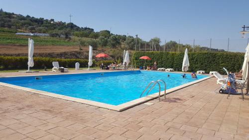 Caltagirone House | Experience Il Casale Delle Rose: Oceanfront Paradise