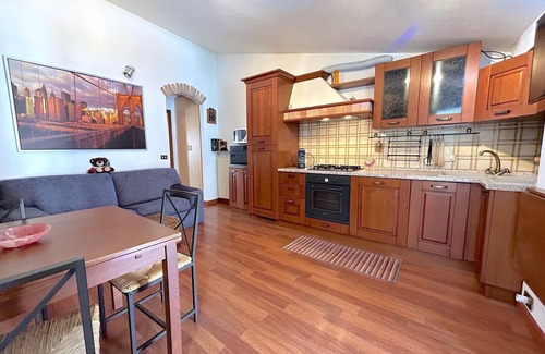 Rezza Apartment | Discover Il Centro nel Borgo: Family-Friendly Stay Awaits