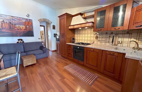 Rezza Apartment | Discover Il Centro nel Borgo: Family-Friendly Stay Awaits