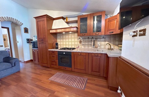 Rezza Apartment | Discover Il Centro nel Borgo: Family-Friendly Stay Awaits