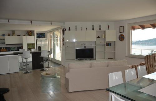 Meina Apartment | Discover Il Girasole: 4-Star Oceanfront Bliss