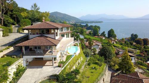 Meina Apartment | Discover Il Girasole: 4-Star Oceanfront Bliss