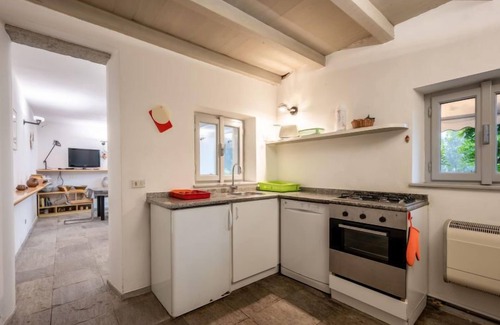 Pettenasco House | Oceanfront Bliss at Il Roccolo by Interhome