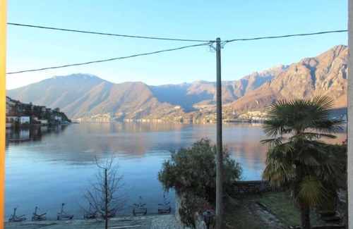 Claino Con Osteno Apartment | Pet-Friendly Il Torrione with Oceanfront Views & Spa