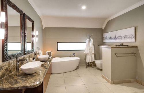 Victoria Falls Hotel | Discover Ilala Lodge Hotel: 4-Star Retreat with Pool & Spa