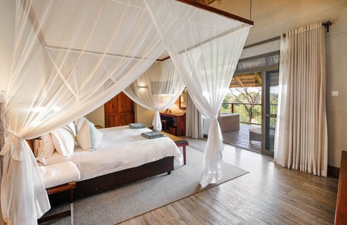 Victoria Falls Hotel | Discover Ilala Lodge Hotel: 4-Star Retreat with Pool & Spa