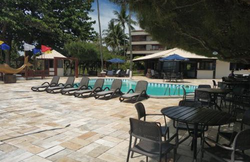 Vera Cruz Apartment | Relax at Ilha dos Corais: Oceanfront Poolside Retreat