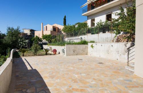 Perama Apartment | Discover Ilianas R&F: Oceanfront Family Retreat Awaits