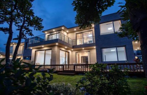 Andeok House | Elegant Oceanfront Retreat at Ililsagye with Pool Access