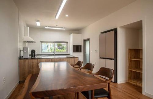 Andeok House | Elegant Oceanfront Retreat at Ililsagye with Pool Access