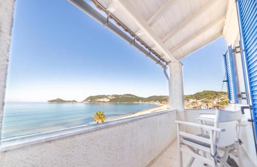 Agios Georgios Pagon Apartment | Experience ILIOS: Guest Rated 9.7 with Oceanfront Views