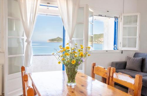 Agios Georgios Pagon Apartment | Experience ILIOS: Guest Rated 9.7 with Oceanfront Views